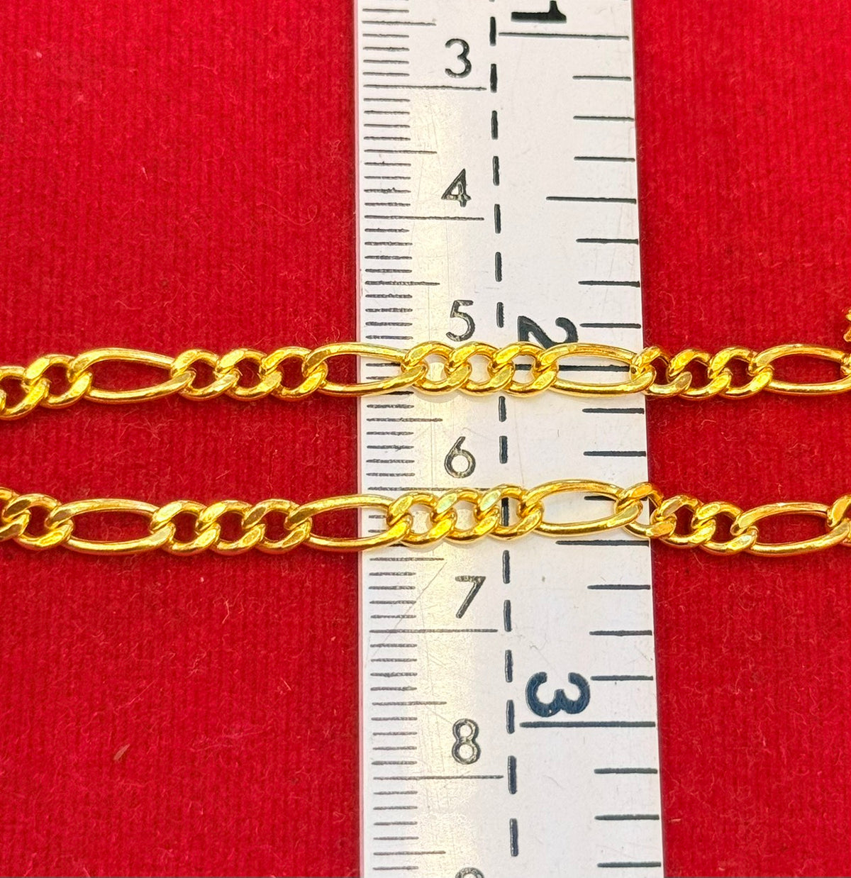 9.2g, 21", Figaro Chain, Lobster Clasp, 23K Gold