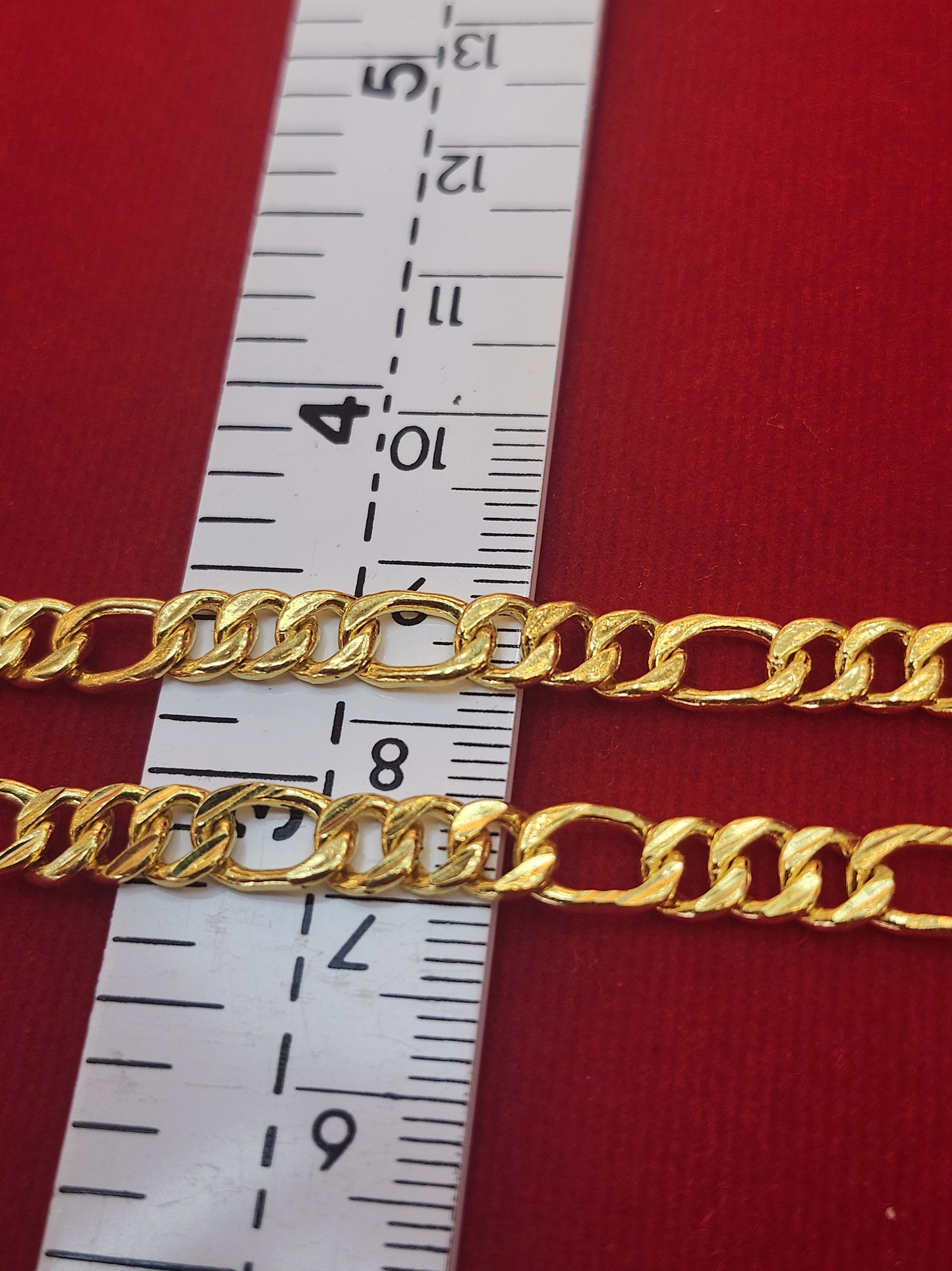 30.5g, 20", Figaro Chain, 23K Gold